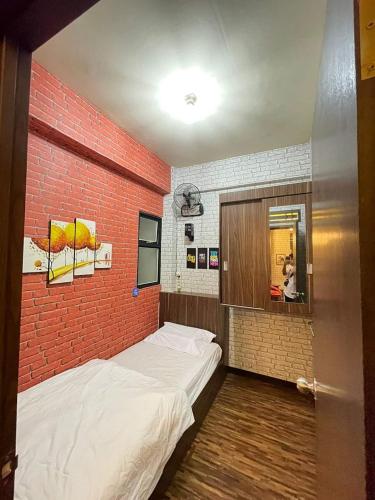 Katil atau katil-katil dalam bilik di The Suites Metro by KS Property