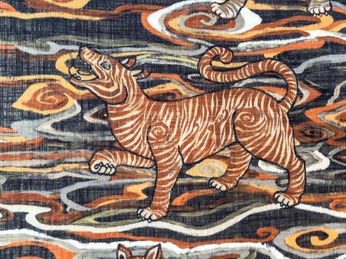 a painting of a tiger on a rug at La Mansion Vi Vadi Hotel in Munich