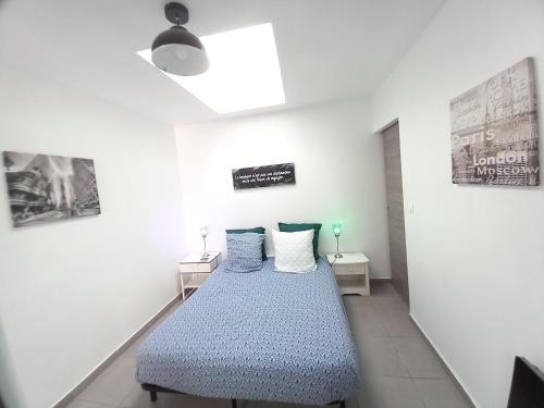 Postel nebo postele na pokoji v ubytování Bel Appartement T2 Climatisé avec piscine Poitiers-Futuroscope-CREPS de Poitiers