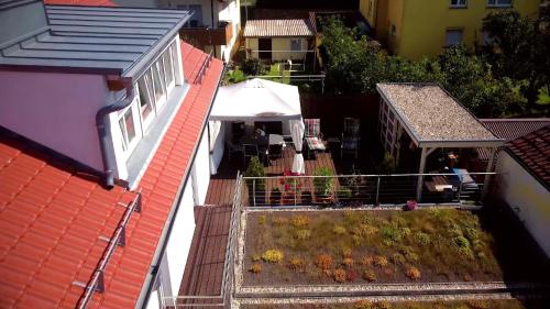 an aerial view of a yard between two buildings at Schubart Apartments in Bietigheim-Bissingen