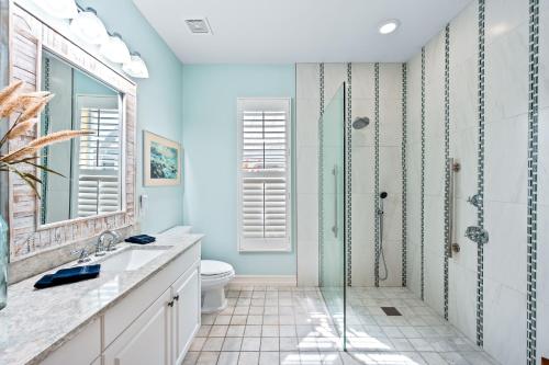 a bathroom with a shower and a toilet at Neapolitan Vacation Rental in Naples