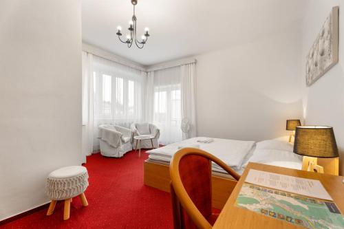Postel nebo postele na pokoji v ubytování Vila Charleston