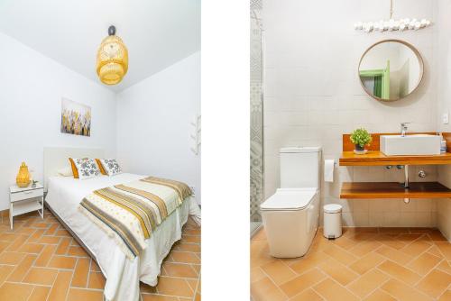 - une chambre avec un lit et une salle de bains pourvue d'un lavabo dans l'établissement Veoapartment Cantabria, à Séville