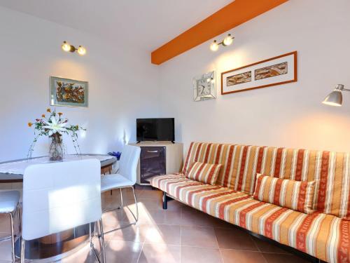 TV a/nebo společenská místnost v ubytování Apartment Mariza-1 by Interhome