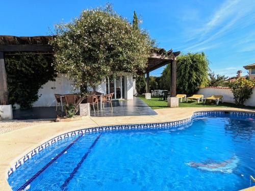 a swimming pool in the backyard of a house at Holiday Home Casa Mexico by Interhome in L’Alfàs del Pi