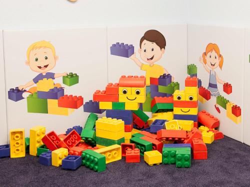 a group of children playing with toys in a room at Apartment Falkner-11 by Interhome in Oberlängenfeld