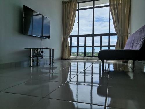 TV a/nebo společenská místnost v ubytování Hamin De Thor Homestay-Benoni Garden Apartment