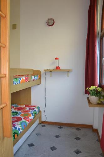 Ένα ή περισσότερα κρεβάτια σε δωμάτιο στο Residence Pian Dei Boschi