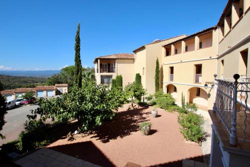 a view from the balcony of a building at Studio Apartment - Domaine du Golf Resort in Roquebrune-sur-Argens