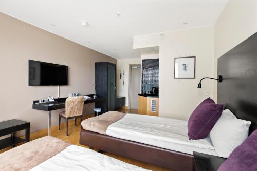 Säng eller sängar i ett rum på Best Western Solna Business Park
