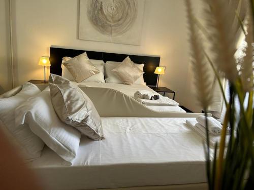 Ліжко або ліжка в номері Brignole Rooms