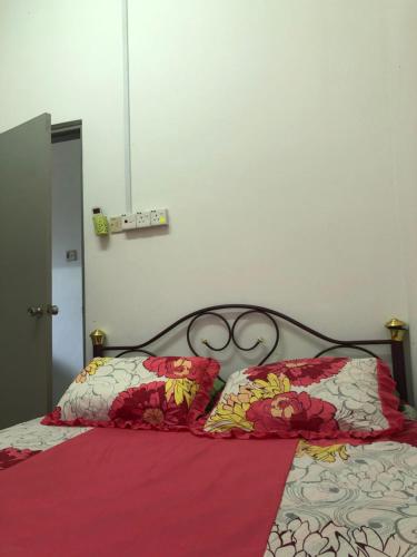 Ένα ή περισσότερα κρεβάτια σε δωμάτιο στο Cg Homestay