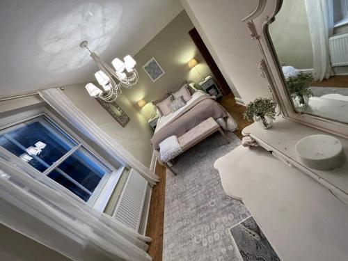 an overhead view of a bedroom with a bed and a mirror at Luxury apartment, 60 High St, St Martins in Lincolnshire