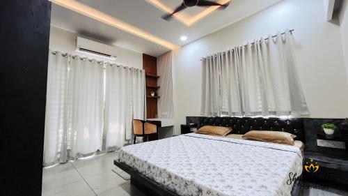 Ένα ή περισσότερα κρεβάτια σε δωμάτιο στο Shyam Sudha Home Stay
