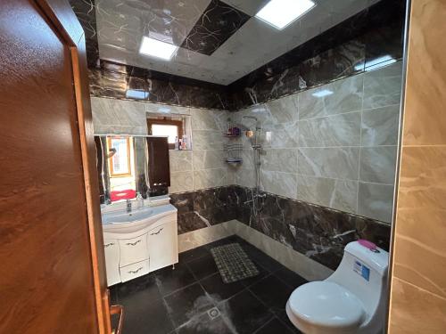 Koupelna v ubytování Oguz villa