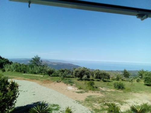 a view from a window of a dirt road at B&B Il Giardino di Circe - Filadelfia (VV) in Filadelfia