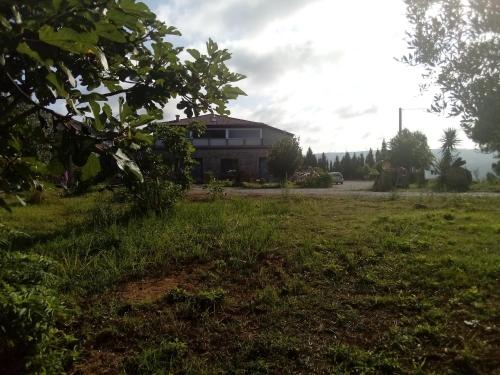 a house in the middle of a field at B&B Il Giardino di Circe - Filadelfia (VV) in Filadelfia