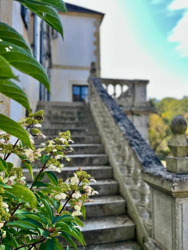a set of stairs in front of a building at Richard Lequet Domaine gastronomique du Val d Atur in Boulazac