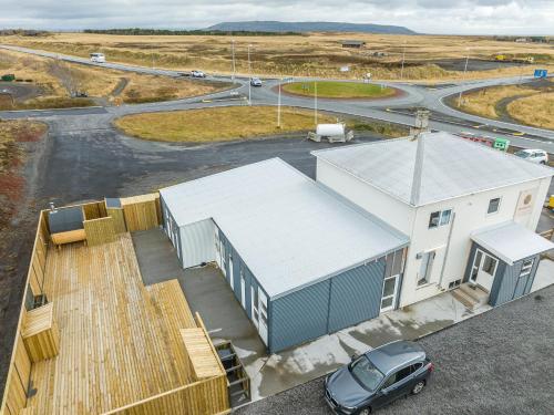 an overhead view of a building with a car parked outside at MB Guesthouse in Grímsnes og Grafningshreppur
