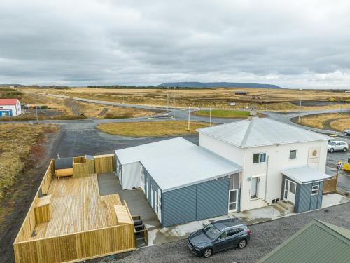 an aerial view of a house with a car parked next to it at MB Guesthouse in Grímsnes og Grafningshreppur
