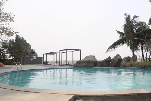 Fotografie z fotogalerie ubytování Cozy Grand Kamala lagoon by Pelita Property v destinaci Bekasi