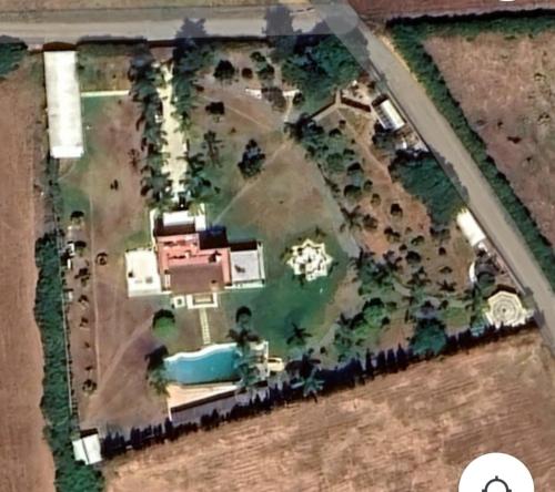 an aerial view of a house with a yard at villa palace in Douar Oulad Jaber