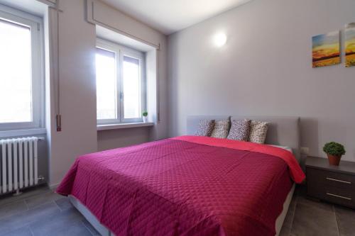 Postel nebo postele na pokoji v ubytování Girasole Apartment - Affitti Brevi Italia