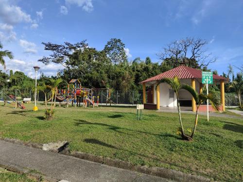 a park with a playground with a play structure at Casa amoblada Dosquebradas in Dosquebradas