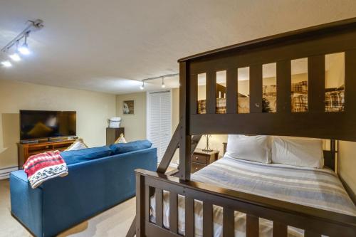 a living room with a bed and a couch at Ski-In Retreat with Pool Access 2 Blocks to Main St in Breckenridge