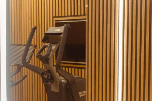 a pay phone is attached to a wall at Strandhotel Ostende in Ahlbeck