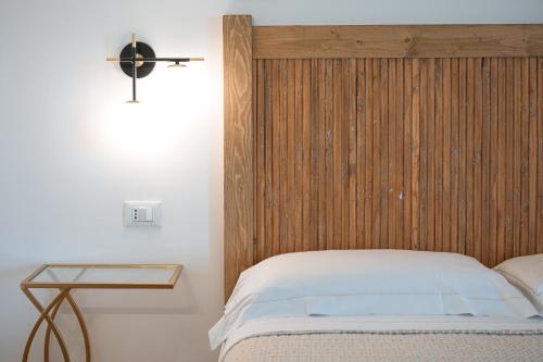 Postel nebo postele na pokoji v ubytování Acqua di Civita Beauty & Rooms IL PONTE