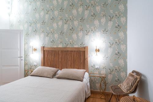 Postel nebo postele na pokoji v ubytování Acqua di Civita Beauty & Rooms IL PONTE