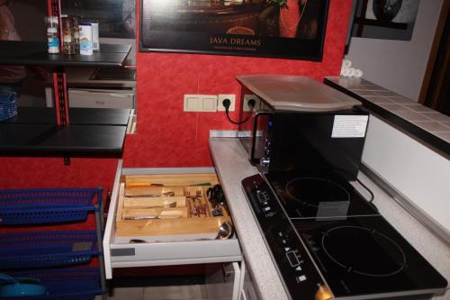 a kitchen with a stove top oven in a kitchen at Wohnen in einer Privatstrasse in Marl