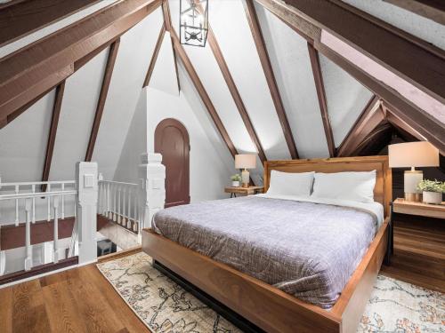 a bedroom with a bed in a attic at Shadyside, Pittsburgh, Modern and Unique 1 Bedroom Unit6 with Free Parking in Pittsburgh