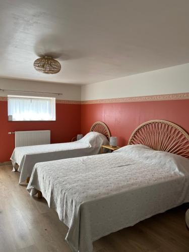 Postel nebo postele na pokoji v ubytování Maison de Preuillé