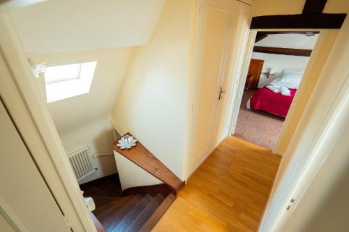 an overhead view of a hallway with a bedroom at RELAIS SAINT JACQUES in Amboise
