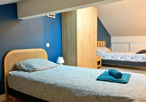 Ένα ή περισσότερα κρεβάτια σε δωμάτιο στο Duplex Gardenia - Lumineux & Central