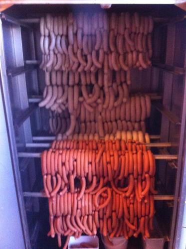 a shelf filled with lots of lots of carrots at Landgasthof Santner in Thalgau
