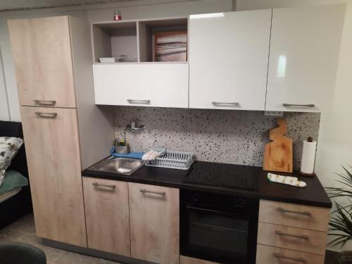 Una cocina o zona de cocina en Studio Primani