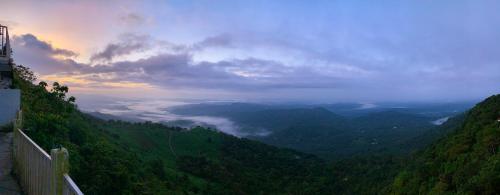 a view of a valley in the mountains at CHILLAX Resorts Palakkayam THATTU in Paithalmala