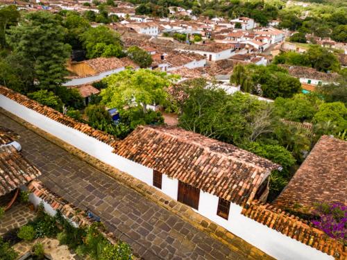 an aerial view of a town with roofs at Achiotte by Masaya Collection in Barichara