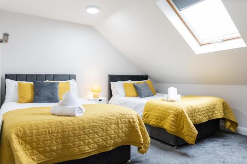 Ένα ή περισσότερα κρεβάτια σε δωμάτιο στο Modern Apartments Near Cardiff City Centre