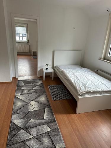 Una cama o camas en una habitación de Appartment for Rent01