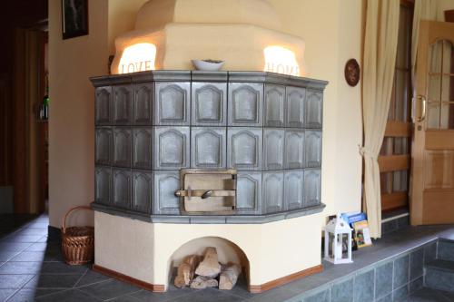 a model of a pizza oven on a wall at Rosenhof in Ebensee