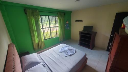 Een bed of bedden in een kamer bij Casa de campo