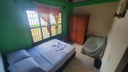 Cama o camas de una habitación en Casa de campo