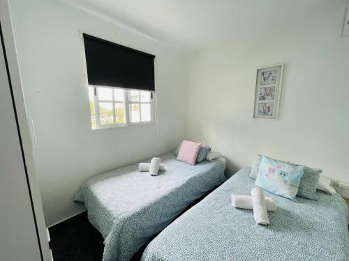 Llit o llits en una habitació de Piscina compartida, Solo Adultos, AC, calefacción