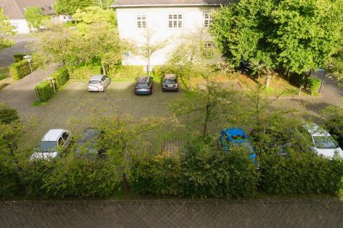 a group of cars parked in a parking lot at HAMA Design Homes Lippstadt in Lippstadt