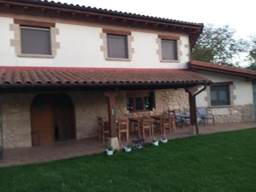 an external view of a house with a patio at Maittia-Larraona in Larraona