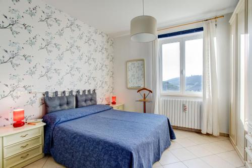 Postelja oz. postelje v sobi nastanitve Appartamento a Spoleto.